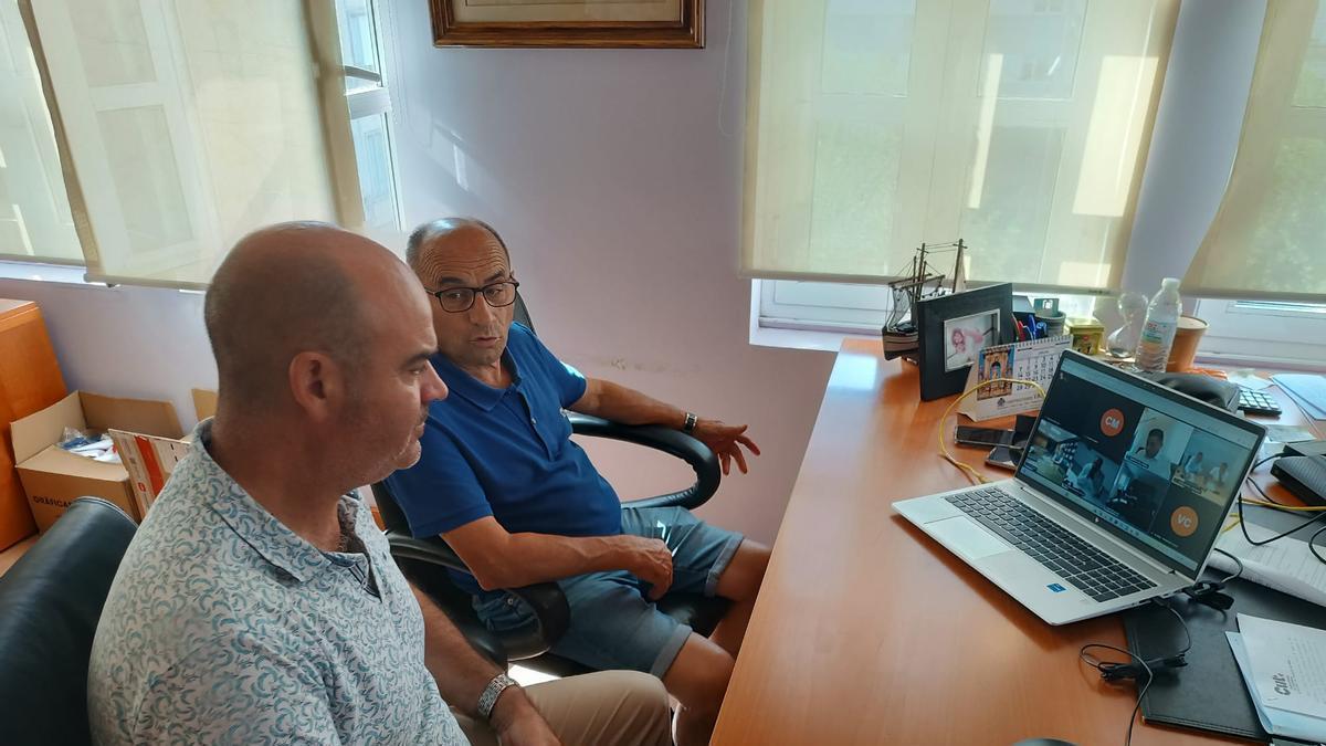 Félix Juncal y Celso Dopazo durante la reunión telemática con Augas de Galicia.