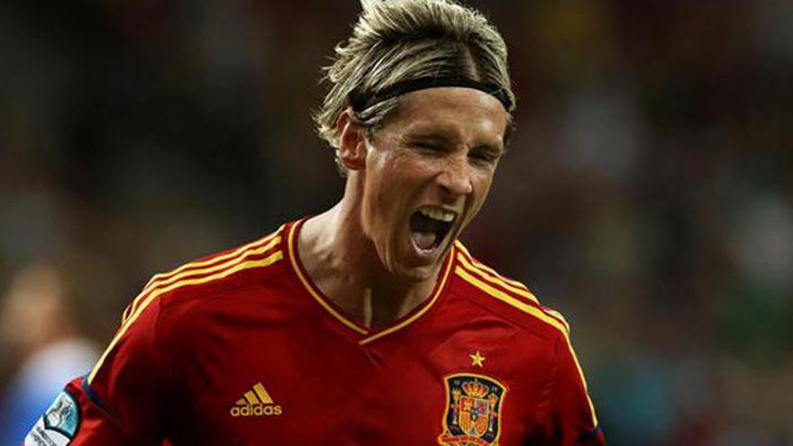Torres celebra su gol a Italia.