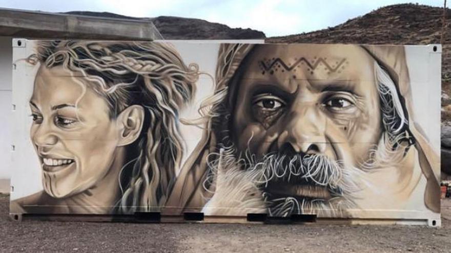 Mural de Sabotaje al Montaje con caras de Aborígenes Canarios