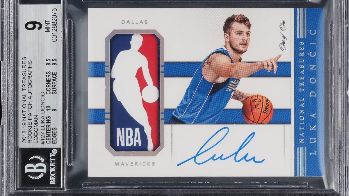Fotografía cedida por la firma de subastas de cromos PWCC donde se muestra un cromo de Luka Doncic, único producido para la serie National Treasures Rookie Patch Autographs (RPA) de Panini