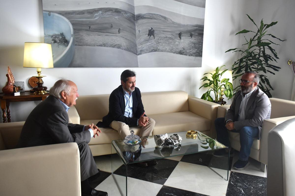 Morales, con Usón y Peiró.