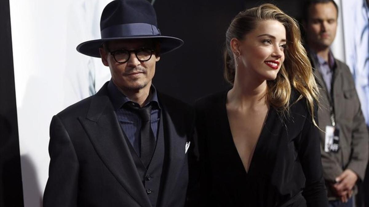 Johnny Depp y Amber Heard, el jueves, durante el estreno de la película.