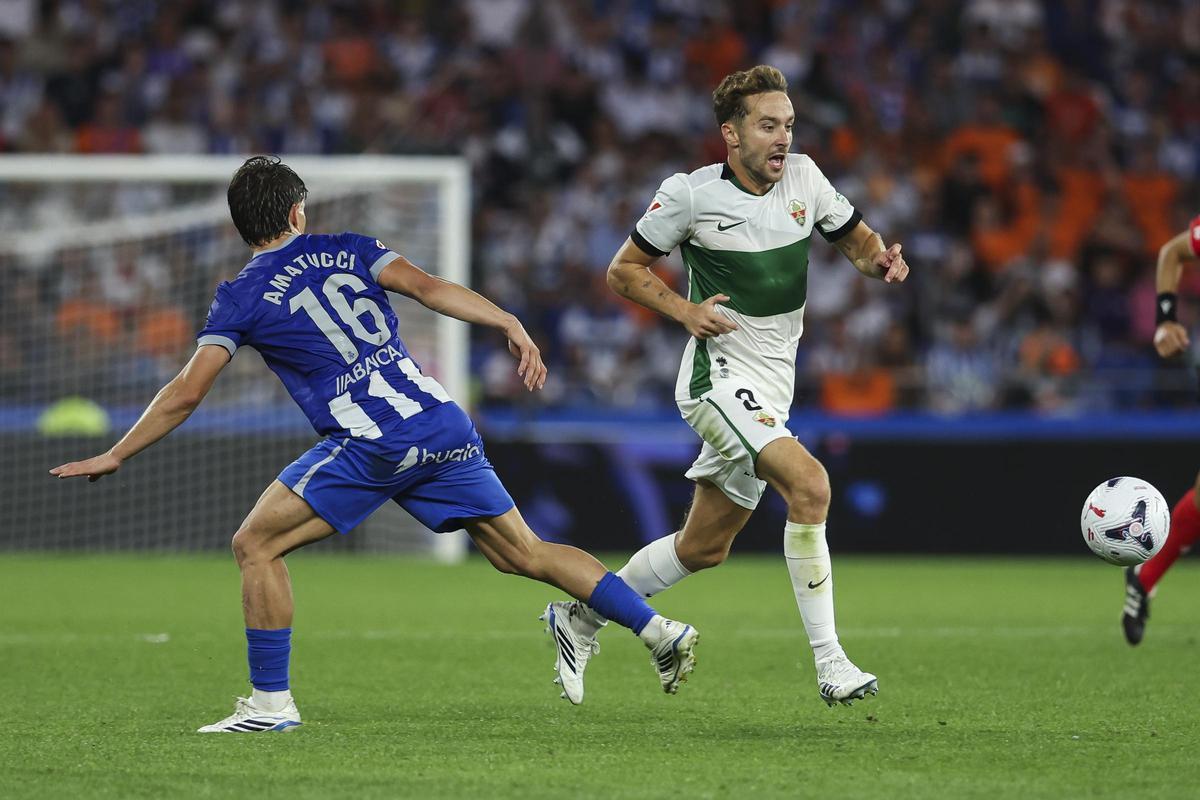 Marc Aguado supera a Amatucci en conducción, el pasado lunes.