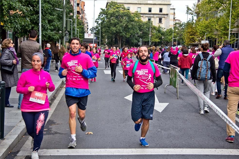 Las imágenes de la marcha y la carrera rosa de Cáceres