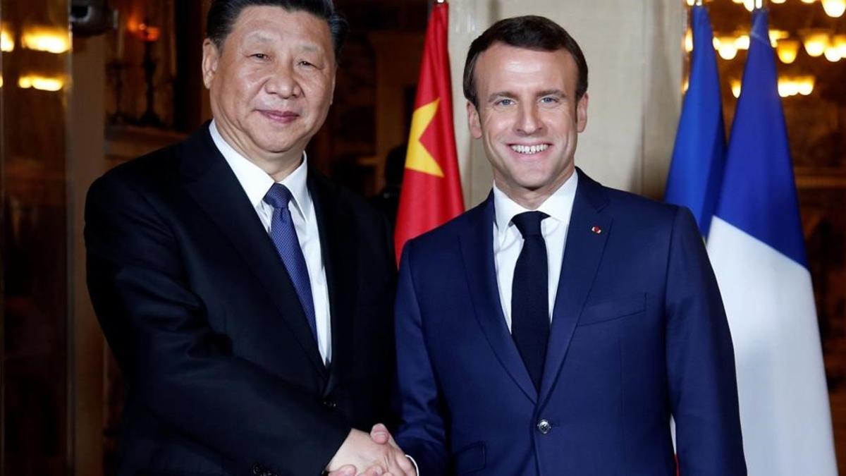 zentauroepp47493081 french president emmanuel macron  r  shakes hand with china 190324201218