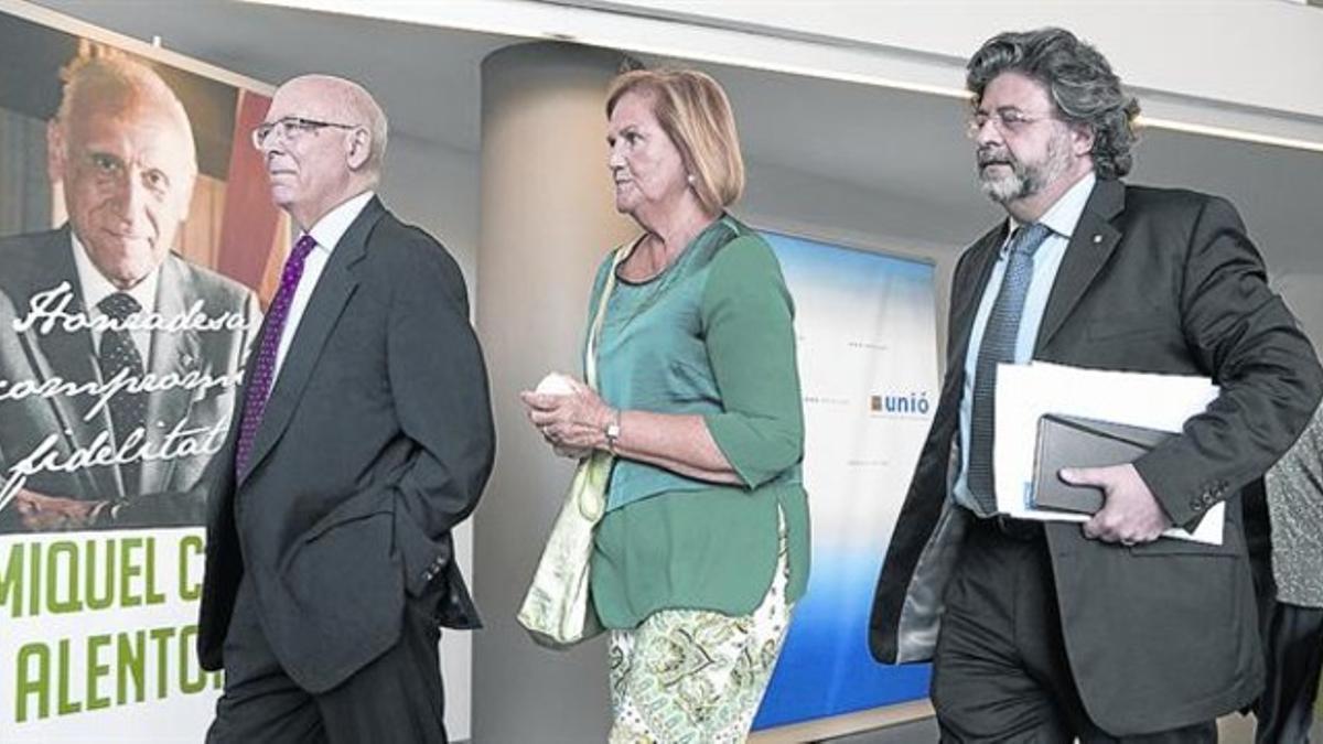 Joan Rigol, Núria de Gispert y Antoni Castellà, ayer, en la sede de Unió.