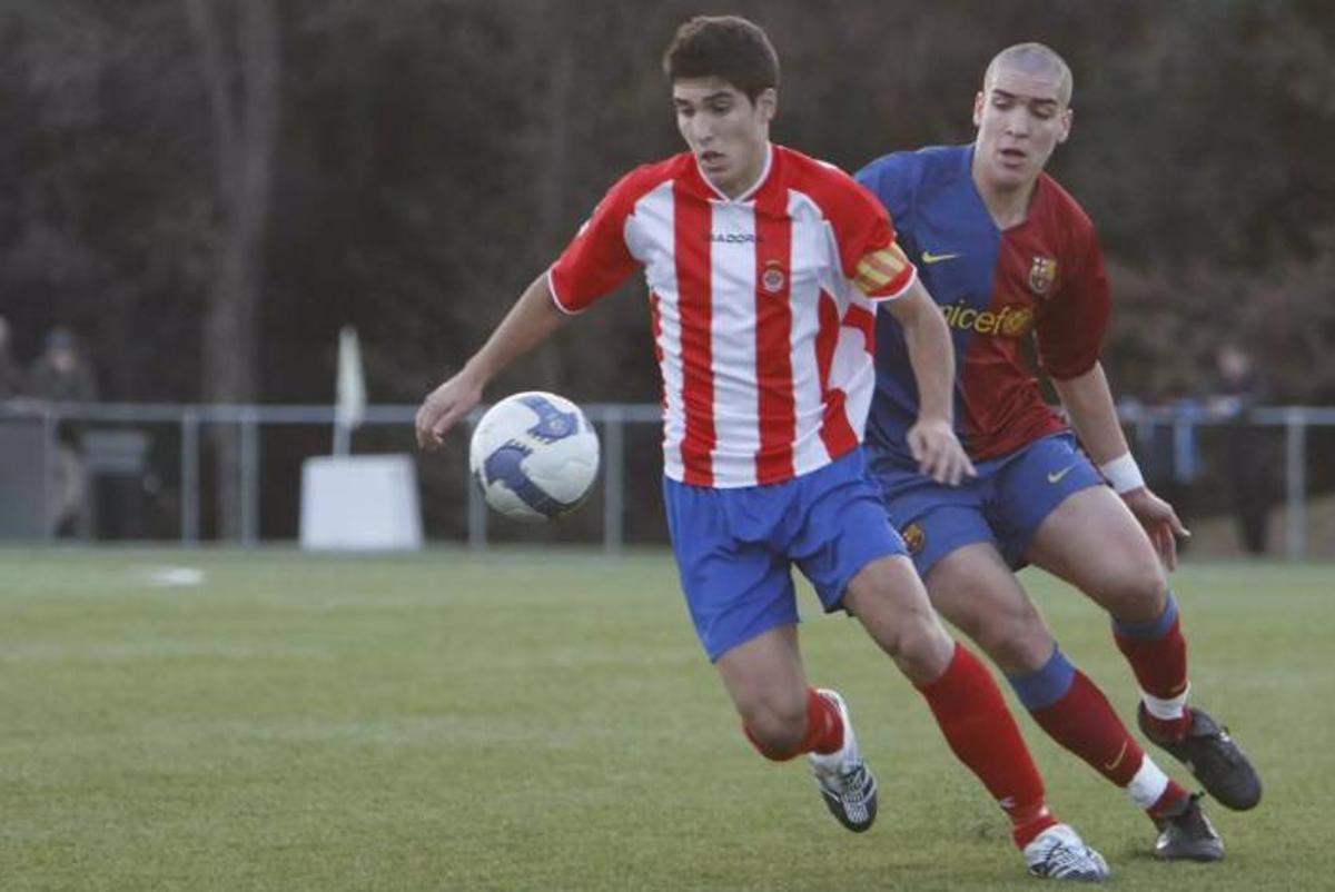 Sergi Romero i Oriol Romeu en un Girona-Barça juvenil.