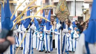 Las carraclas de la Entrada abren el Domingo de Ramos en Zaragoza entre palmas y humildad