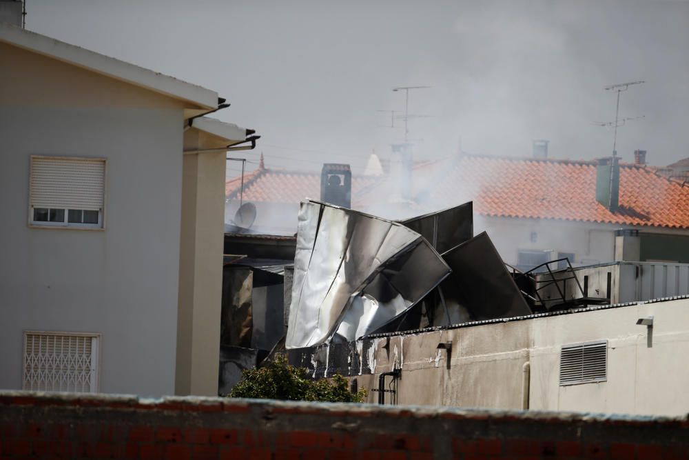 Smoke is seen where a small airplane crashed ...