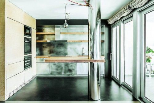 Apartamento suizo de madera y metal