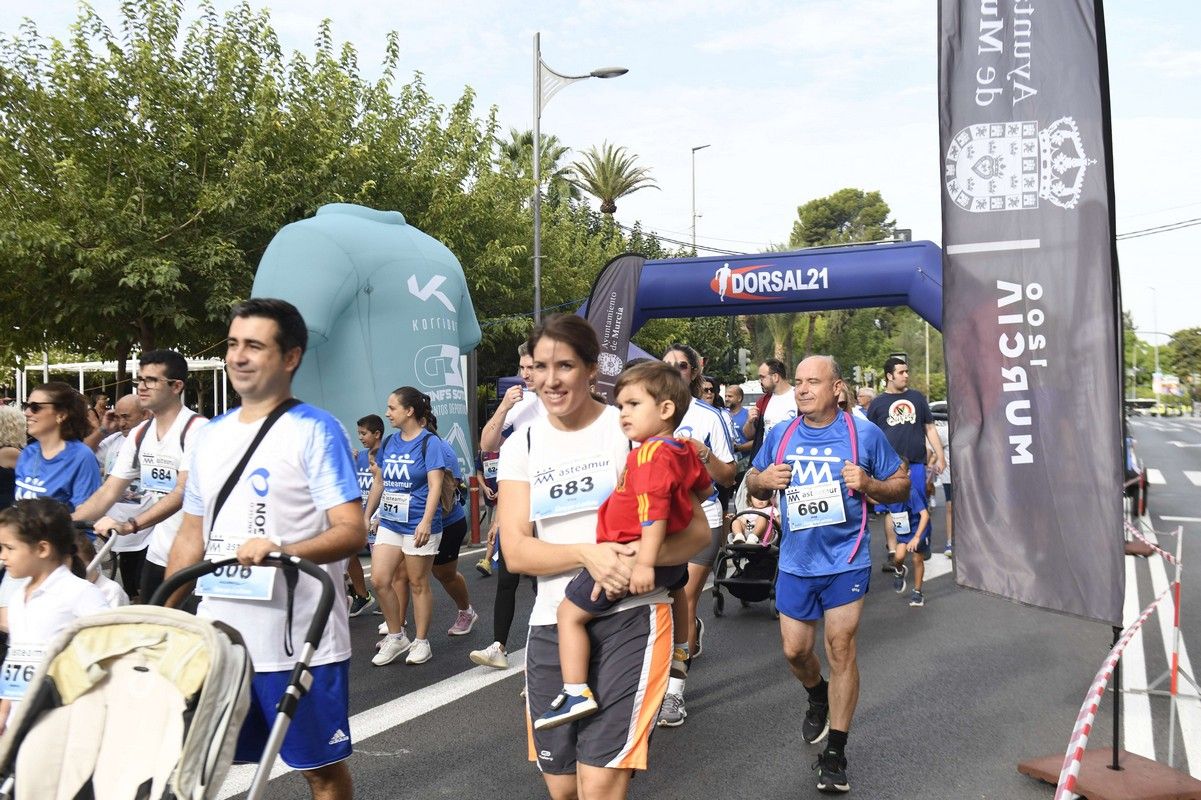 La carrera y marcha Solidaria Asteamur, en imágenes