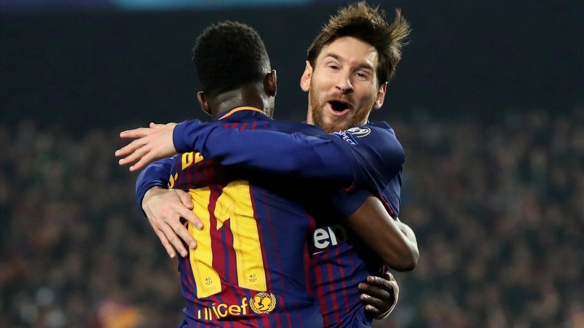 Messi, abrazando a Dembélé.