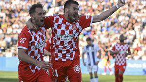 Cristhian Stuani y Portu celebran el gol del Girona en Leganés.