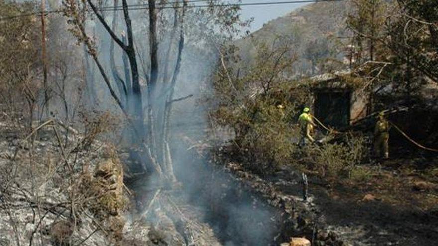 Dos detenidos por provocar un incendio