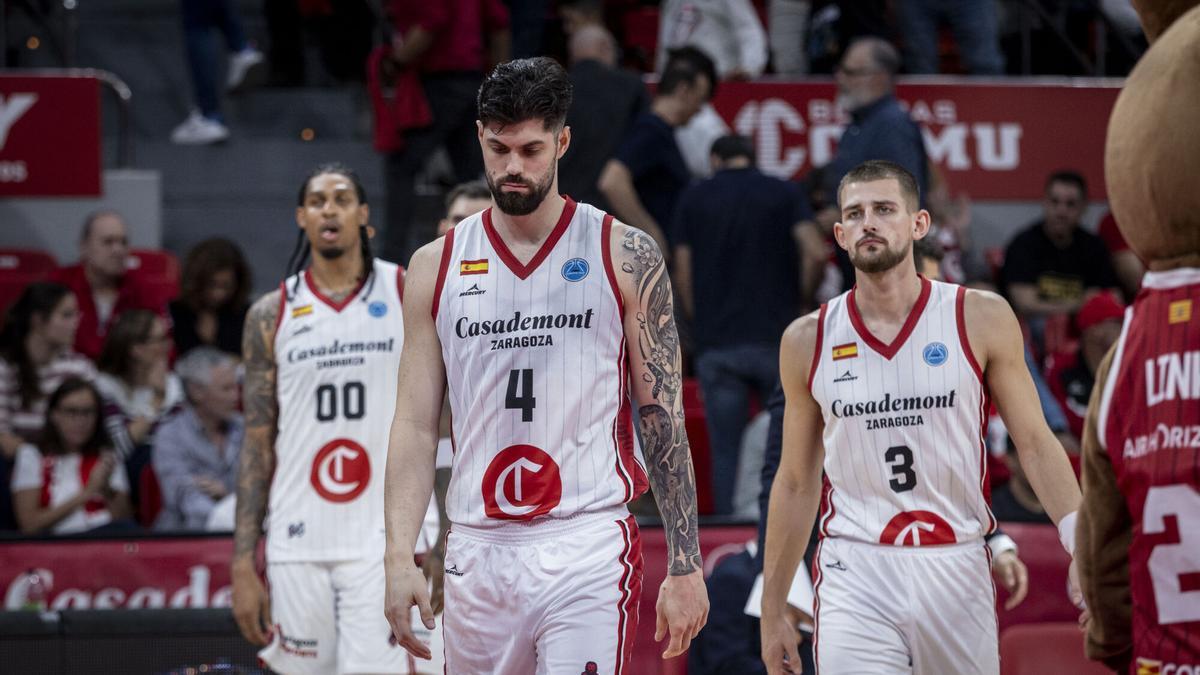 Robinson, Yusta y Stevenson, durante el partido frente al Falco.