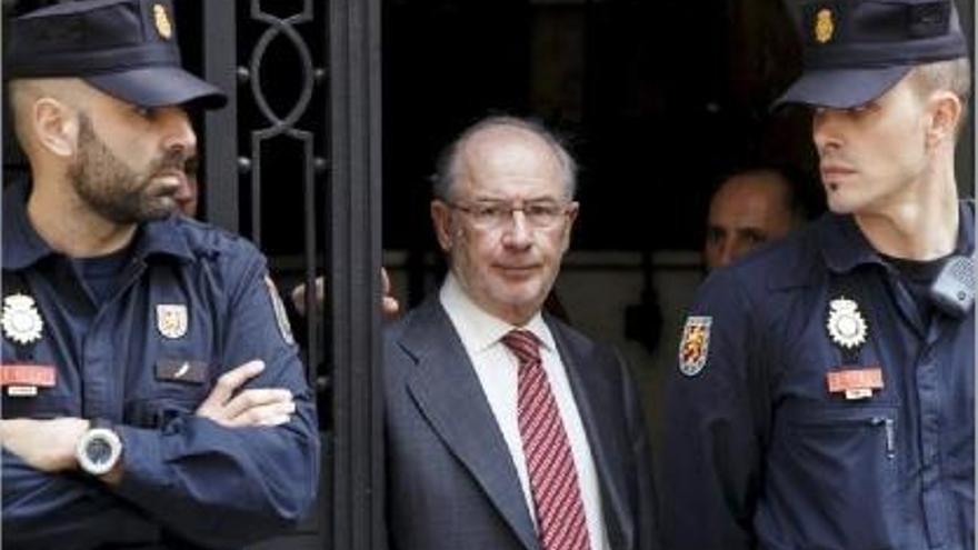 Rodrigo?Rato, en una foto d&#039;arxiu sortint de declarar a l&#039;Audiència Nacional.