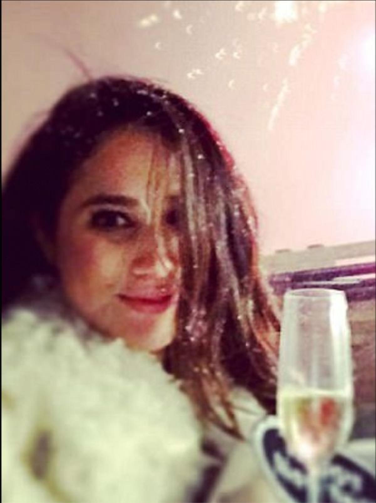 Foto de Meghan Markle con una copa de champagne, borrada de su cuenta de Instagram