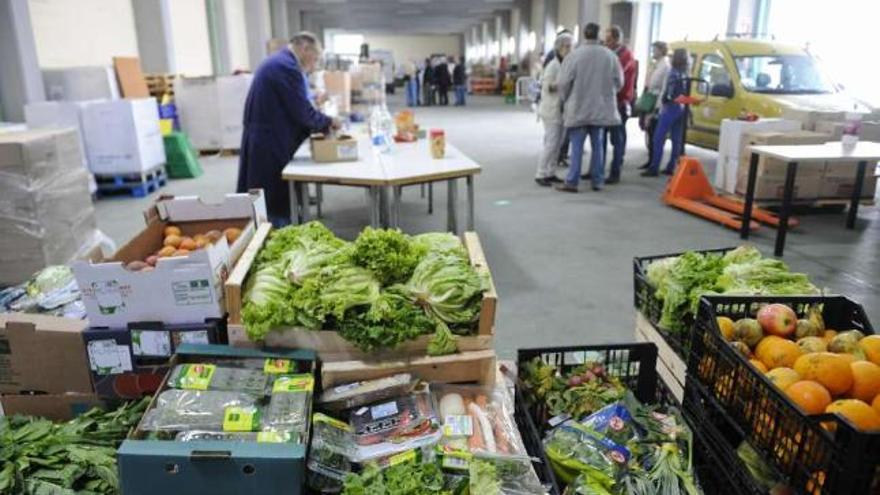 Suministros almacenados en el Banco de Alimentos Rías Altas. / fran martínez