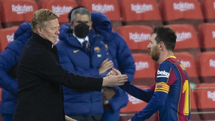 Koeman i Messi durant un partit