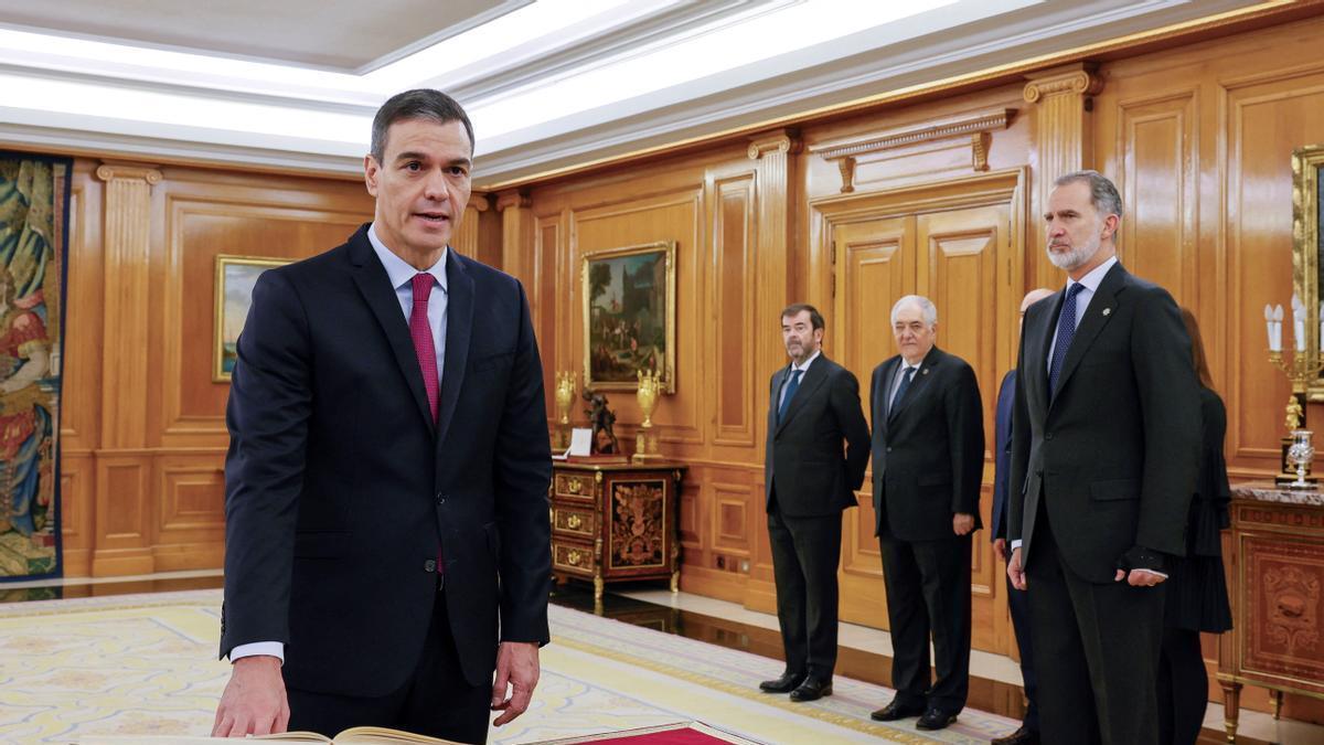 Spain's PM Sanchez takes the oath of office during a ceremony at Zarzuela Palace in Madrid