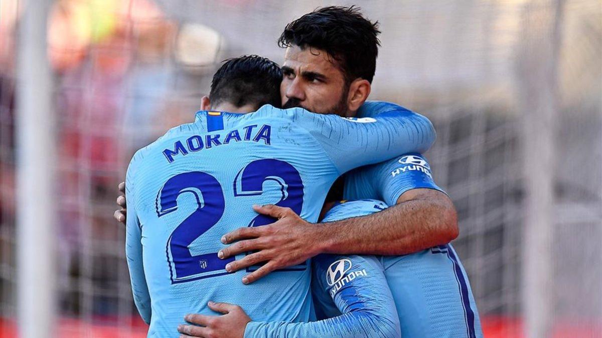 El tridente del Atlético celebra un gol hace unos días