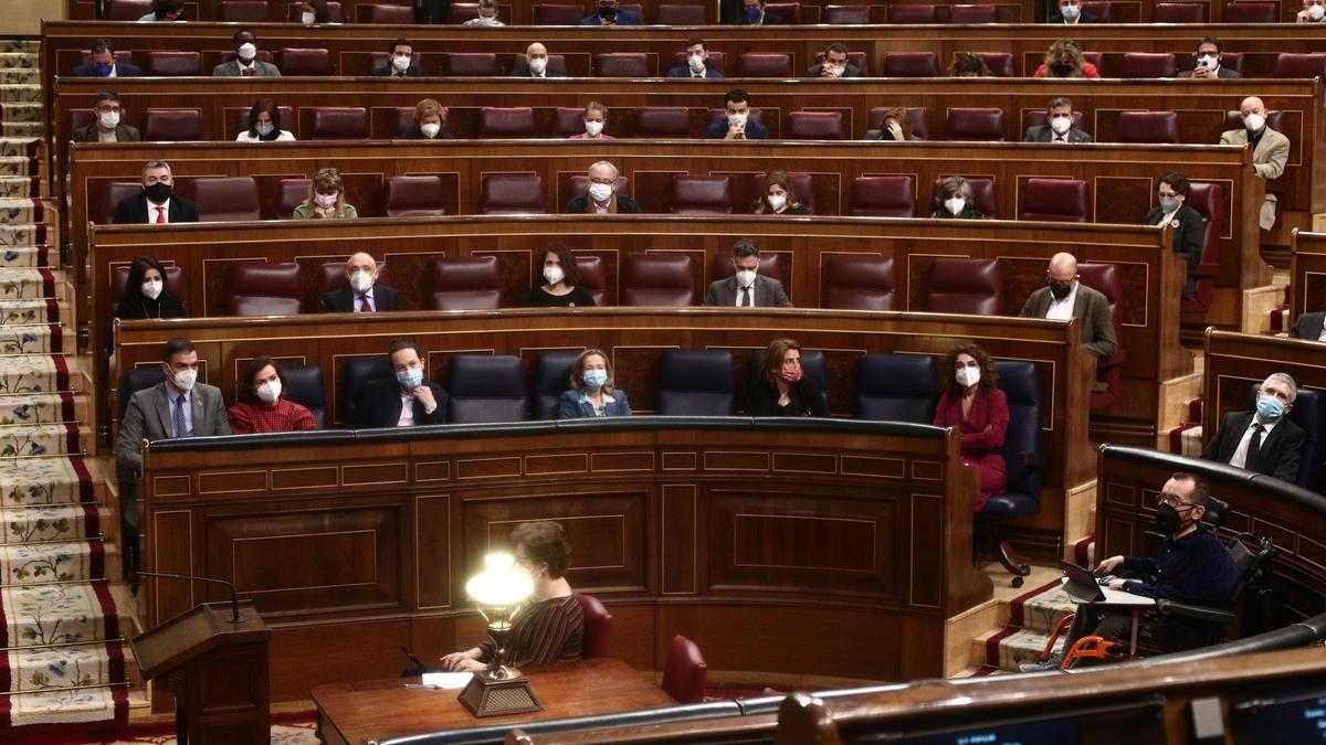 Los miembros del Gobierno de coalición, sentados en el Congreso de los Diputados