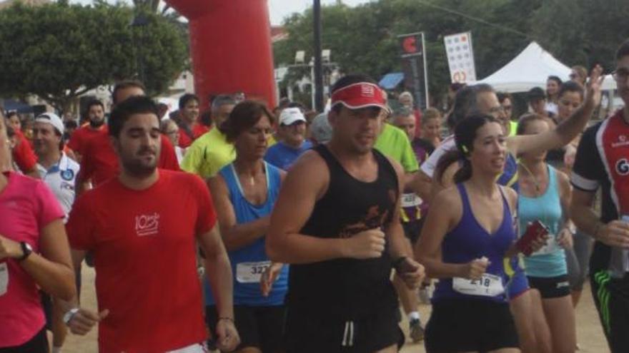 Atletas en acción en el Cross Nocturno