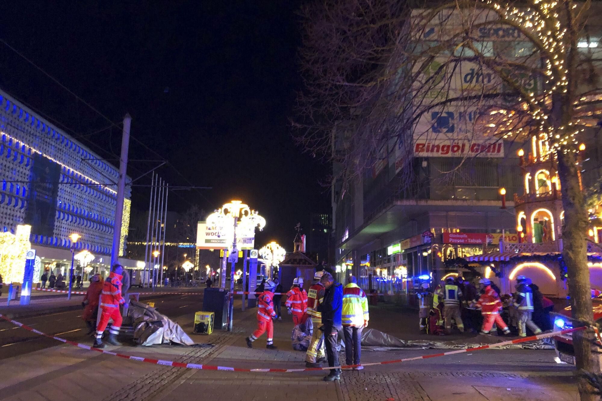 Emergency services attend an incident at the Christmas market in Magdeburg, Germany, Friday Dec. 20, 2024. (Dörthe Hein/dpa via AP). GERMANY OUT; MANDATORY CREDIT