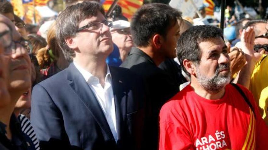 Carles Puigdemont i Jordi Sànchez, durant els actes de la Diada.