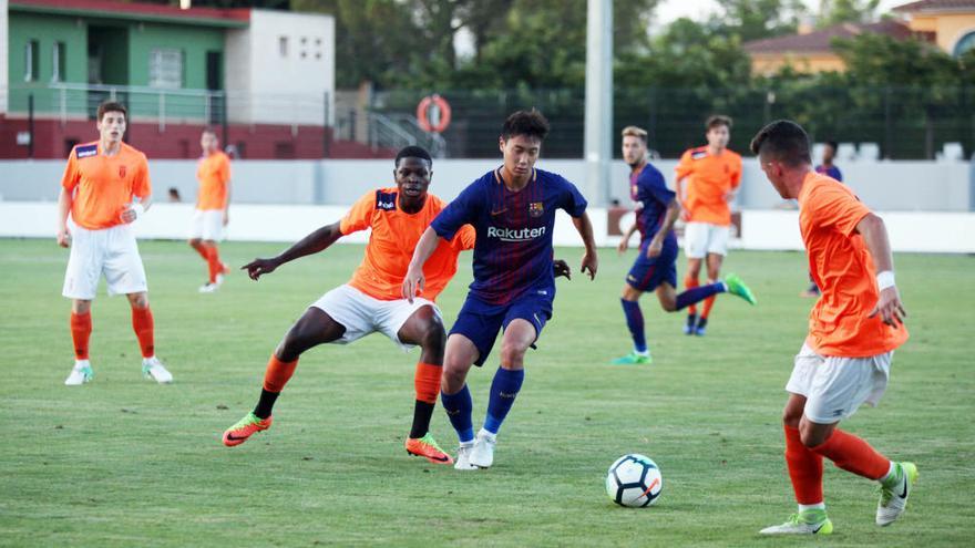 Paik, en una jugada del Peralada-Girona B-Barça B