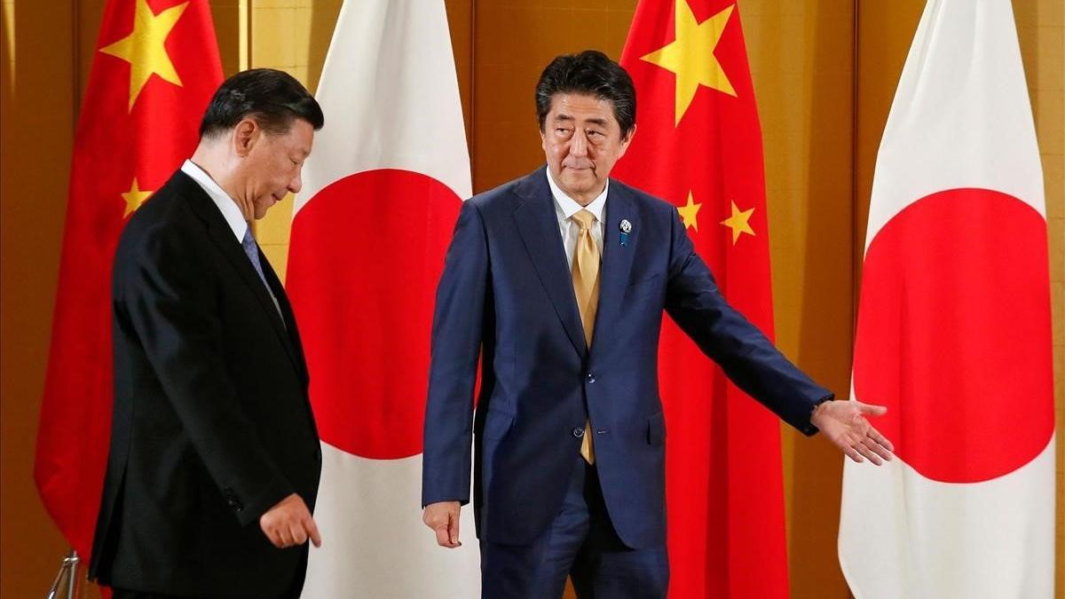 Shinzo Abe recibe a Xi Jinping en Osaka.