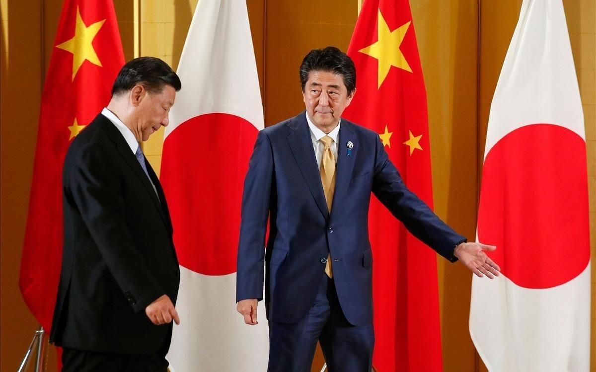 zentauroepp48818335 chinese president xi jinping l is escorted by japanese pri190627195541 zentauroepp48818335 chinese president xi jinping l is escorted by japanese pri190627195541
