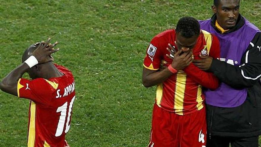 Los jugadores de Ghana, desolados tras la eliminación.