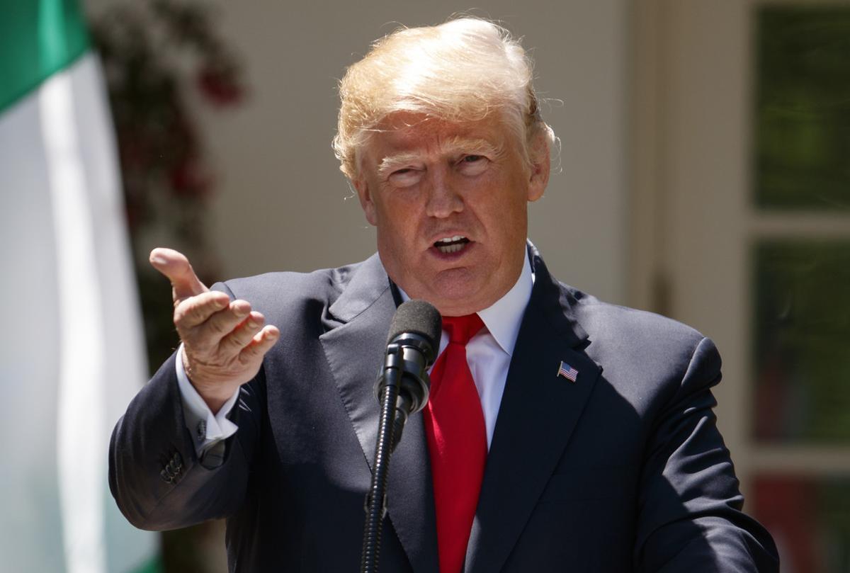 President Donald Trump speaks during a news conference with Nigerian President Muhammadu Buhari in the Rose Garden of the White House in Washington, Monday, April 30, 2018.(AP Photo/Carolyn Kaster)