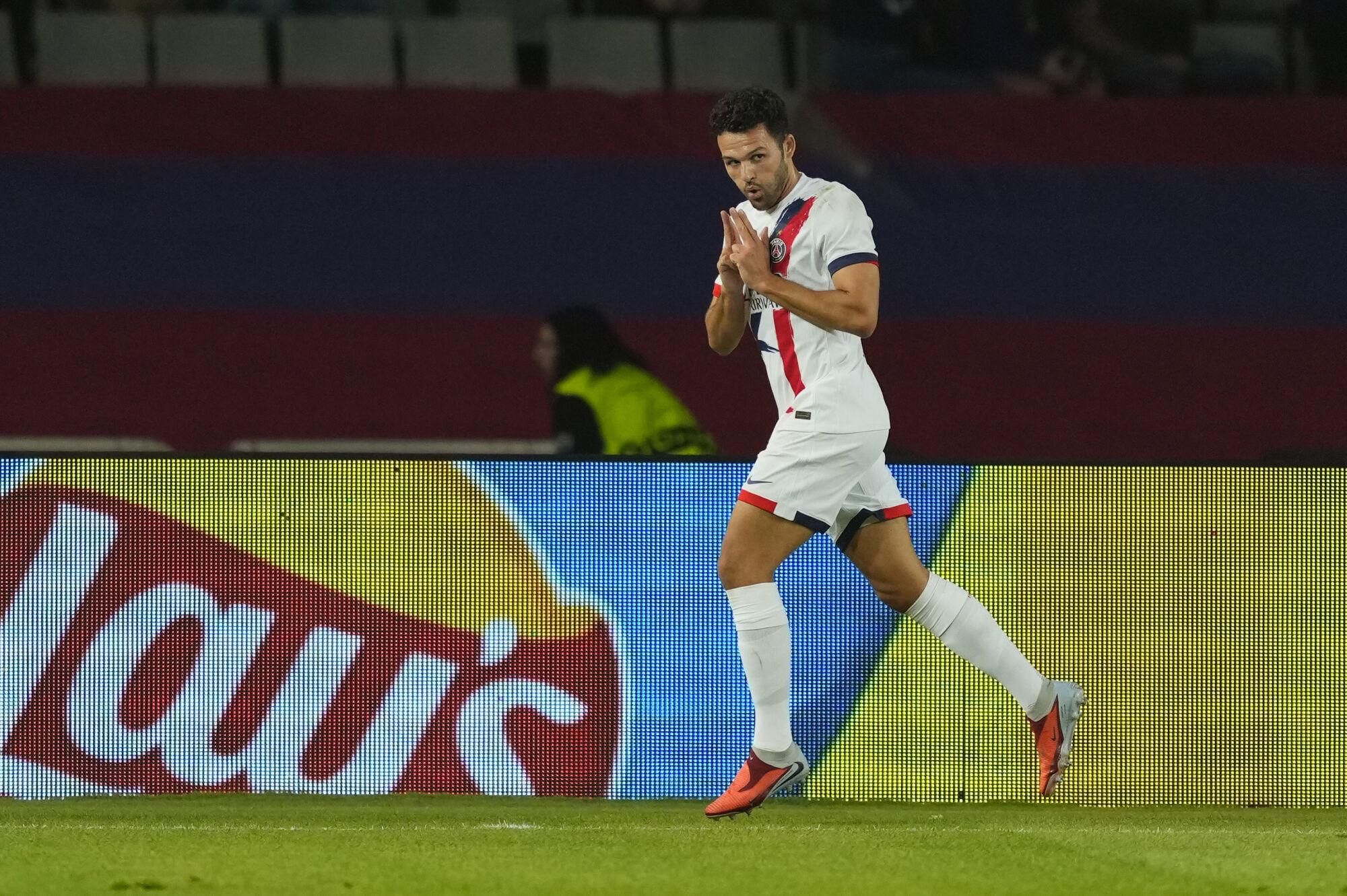 Paris Saint Germain's forward Gonçalo Ramos celebrates after scoring the 1-2 goal during the UEFA Champions League phase soccer match between FC Barcelona and PSG in Barcelona, Spain, 01 October 2025. EFE/Alejandro Garcia