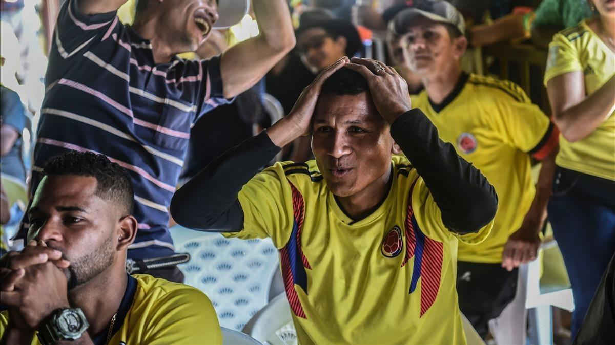 Reacción de un aficionado colombiano en el partido frente Japón