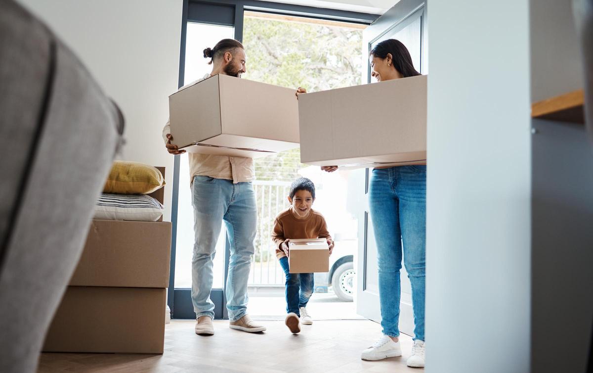 family moving new house box with property happy people child with real estate home owner excited kid mortgage relocation parents walking front door with apartment move boxes