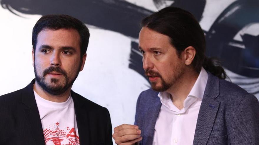 Alberto Garzón, junto a Pablo Iglesias.