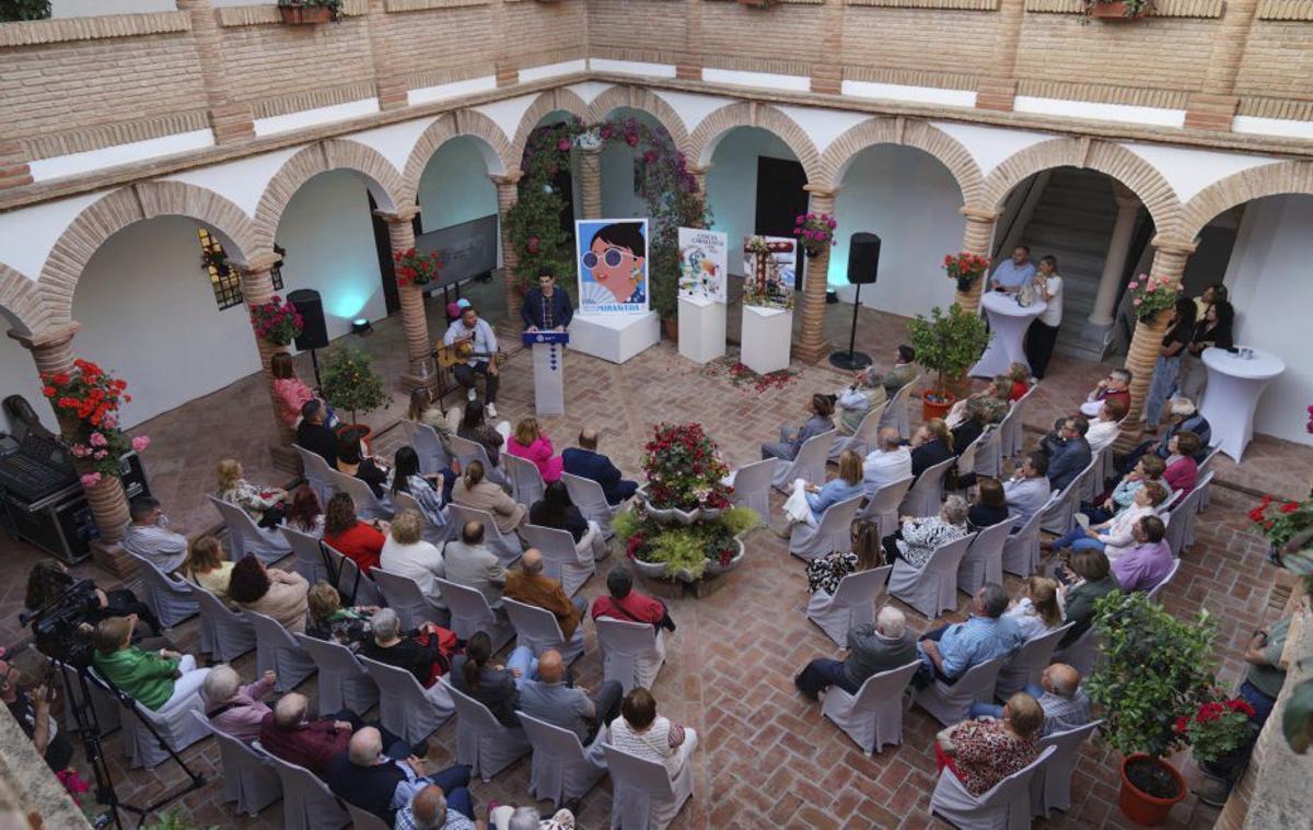 Presentación, ayer, del cartel de la feria de mayo. | L.O.
