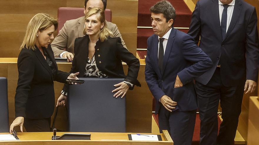 La exconsellera de Justicia e Interior, Salomé Pradas, y el presidente de la Generalitat, Carlos Mazón.