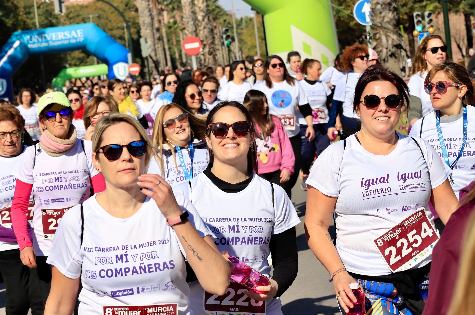 La salida y el recorrido de la Carrera de la Mujer 'inmortalizados' en imágenes