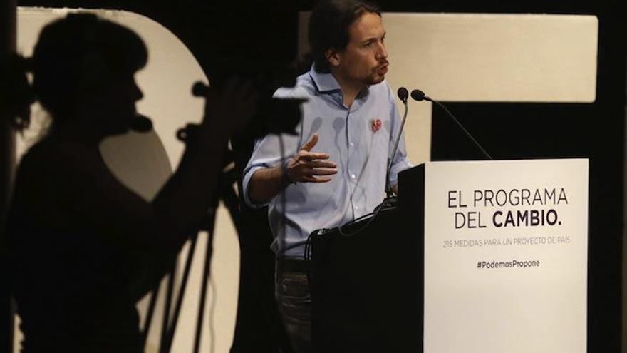 El secretario general de Podemos, Pablo Iglesias, durante su intervención en la presentación del programa con el que concurre a las elecciones del 24M, hoy en Madrid.