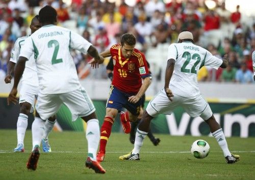 Spain's Jordi Alba breaks through Nigeria's defense to score a goal during their Confederations Cup Group B soccer match at the Estadio Castelao in Fortaleza