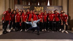 C. Tangana con los jugadores del Celta.