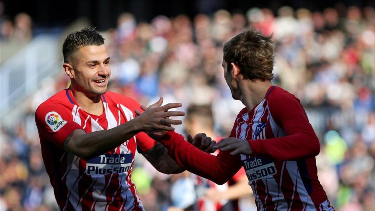 Vítolo y Griezmann celebran el gol