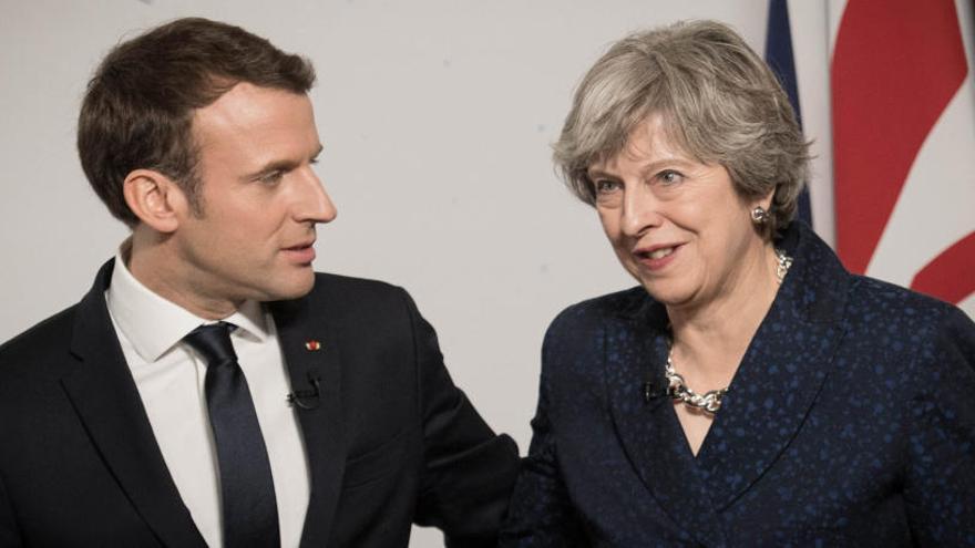 Macron y May, antes de su rueda de prensa.