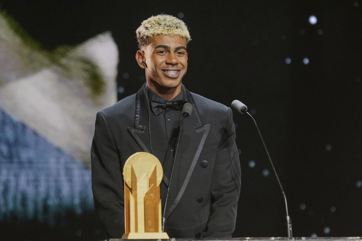 Barcelonas Spanish player Lamine Yamal receives the Kopa Trophy during the 69th Ballon dOr (Golden Ball) award ceremony at Theatre du Chatelet in Paris, Monday, Sept. 22, 2025. (AP Photo/Thibault Camus)