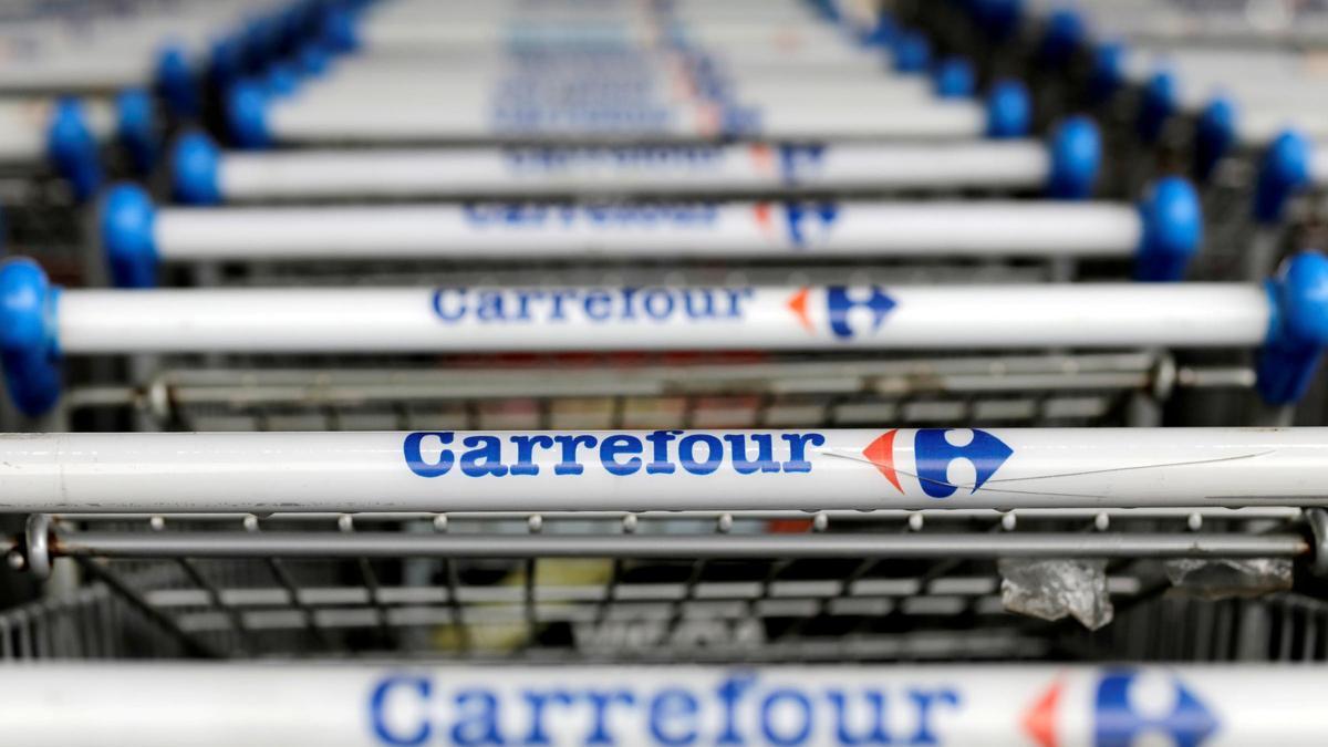 FILE PHOTO: The logo of French retailer Carrefour on shopping trolleys in Sao Paulo