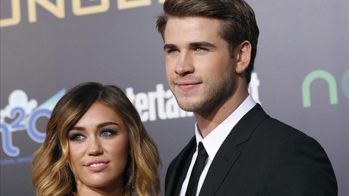 mroca19394427 cast member liam hemsworth poses with actress mile160327212455