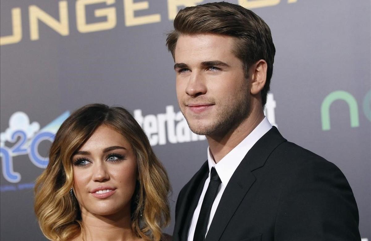 mroca19394427 cast member liam hemsworth poses with actress mile160327212455